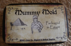 detail_3444_tin_-_mummy_mold.jpg