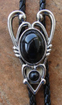 SYMBOL BOLO TIE