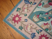 detail_42_Embroidered_Rug_Turq_corner.jpg